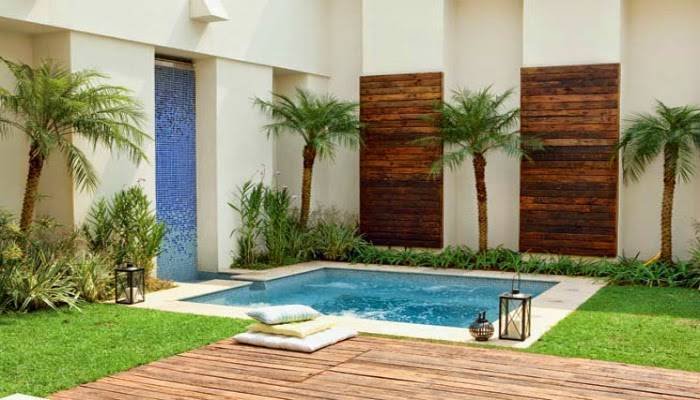 7 Ideias para Criar uma Área de Lazer Pequena 13 Inspiração mostrando uma área simples, mas bem otimizada para ser utilizada como área de lazer.
