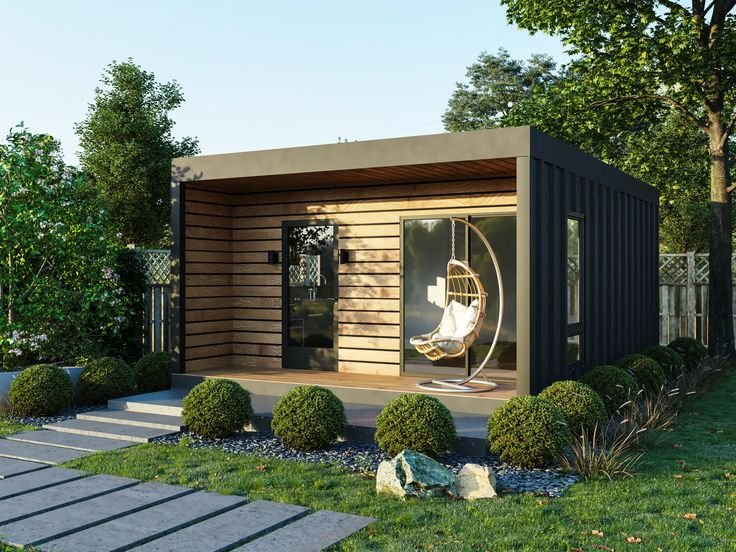 7 Vantagens da Casa Modular: Rapidez, Flexibilidade e Sustentabilidade 6 Casa modular pequena com arbustos na frente