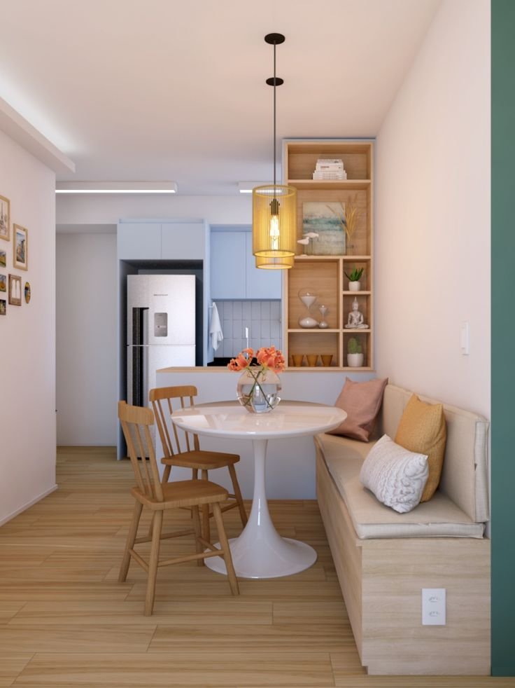 5 Formas de Incorporar a Mesa de Canto na Cozinha 1 Cozinha clara com mesa de madeira e tampo branco