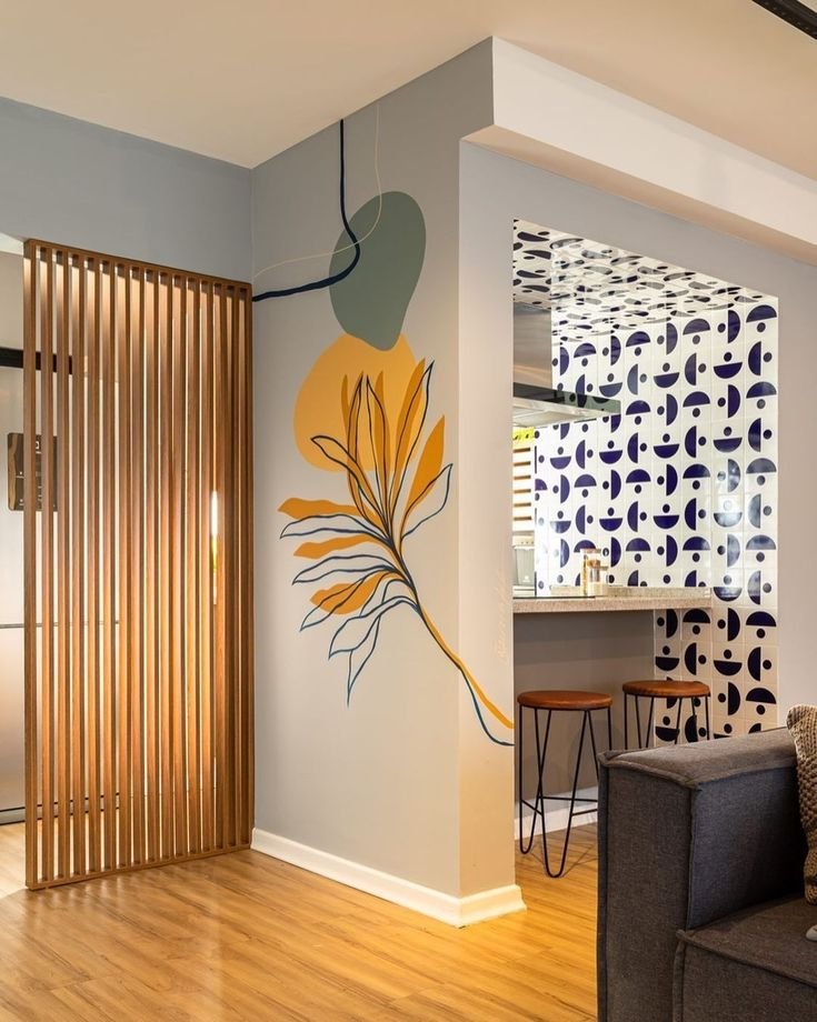8 Ideias Inovadoras para Decorar Paredes Pequenas 5 Parede com ramos de folhas
