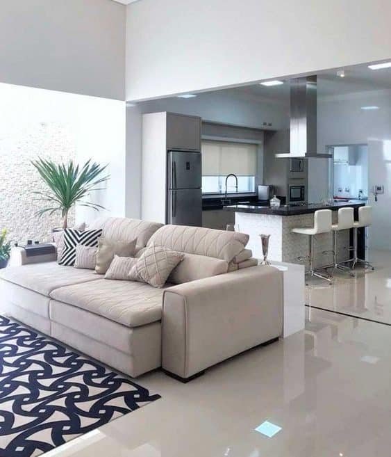 Sala e Cozinha Integradas: 7 Dicas de Estilo e Funcionalidade 9 Sala e cozinhas integradas branca e cinza